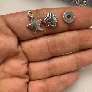 خرجکار نقره‌ای | ستاره، صدف و واشری برای ساخت زیورآلات دست‌ساز و فانتزی